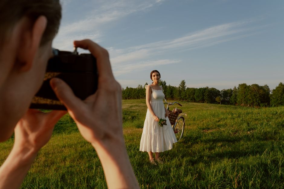 Capture serene moments with couple in a lush summer meadow.